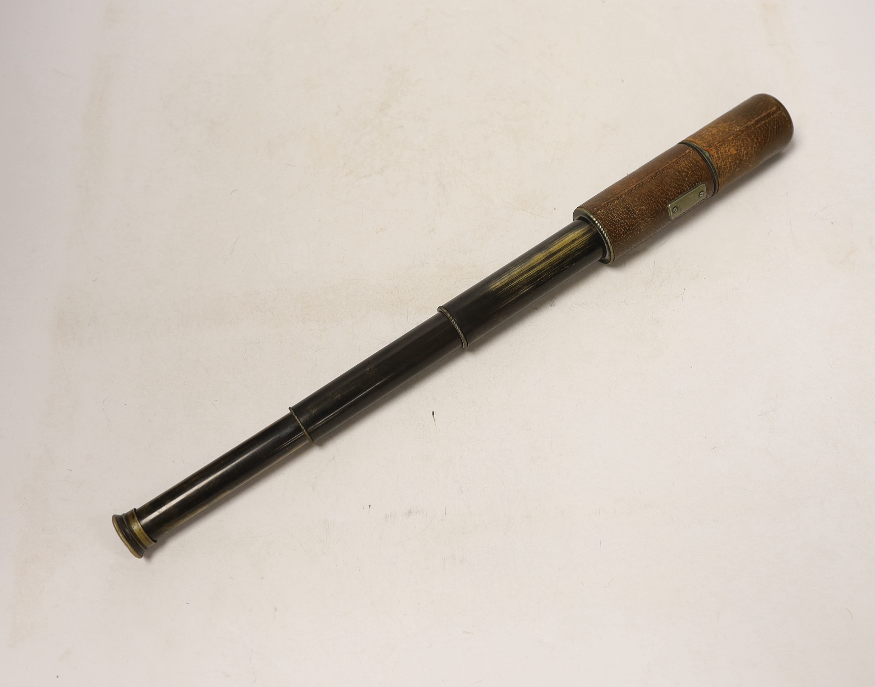 A Victorian officer’s dress sword, Wilkinson blade, together with a telescope, sword, 102cm in length